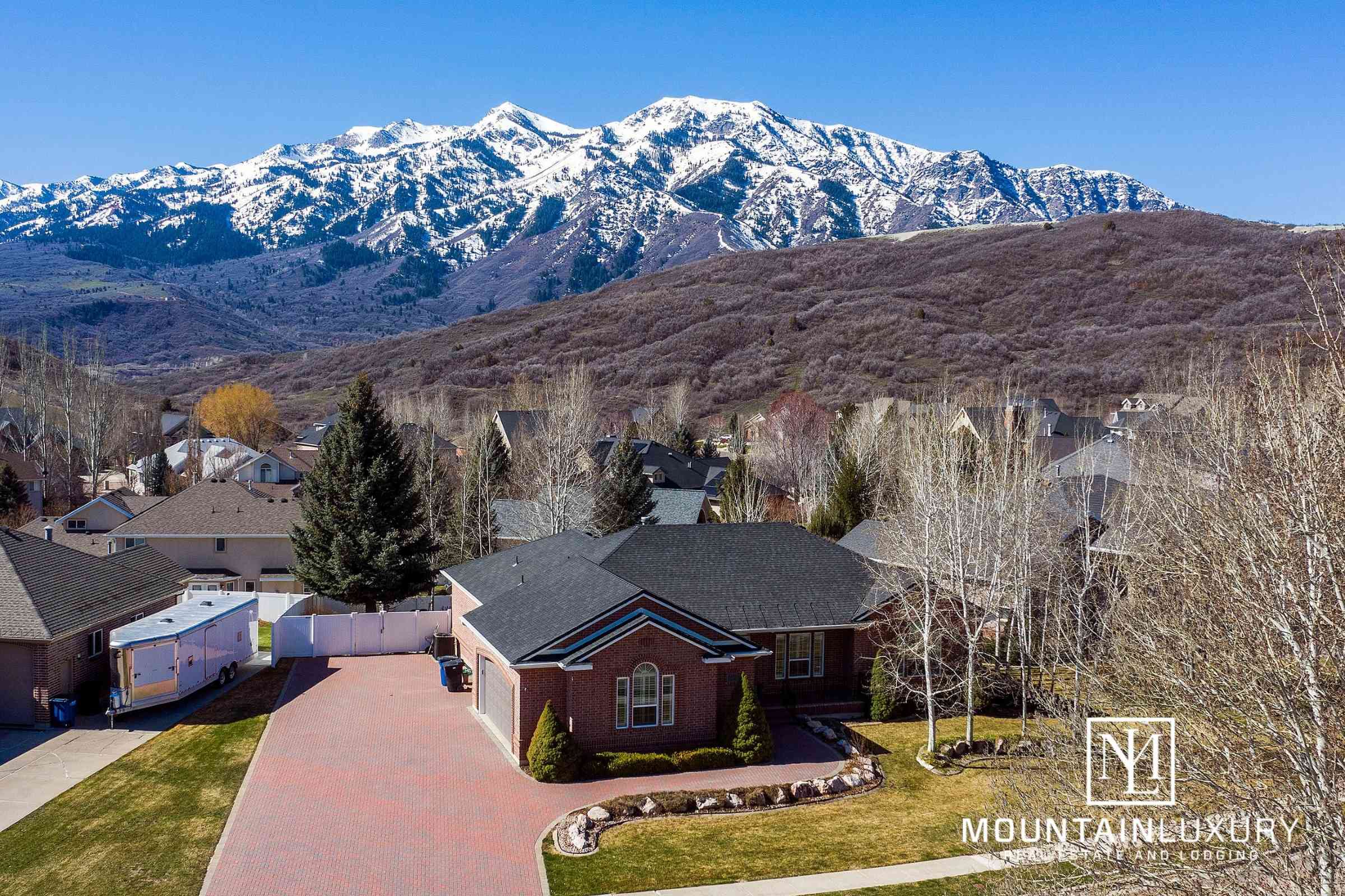 5185 Frontier Dr, Mountain Green drone photo of house and view